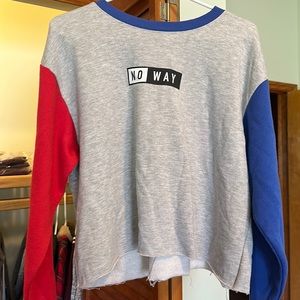 Red and blue long sleeve block color sweater